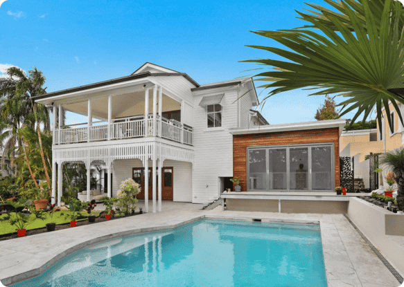 Modern villa with swimming pool and well-kept lawn in the backyard