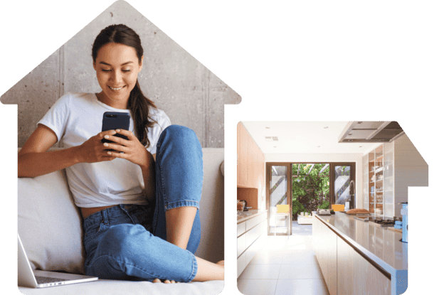 Smiling girl using phone while sitting comfortably on couch